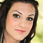 Curvy Brazilain babe with a slamming body and awesome breasts! 